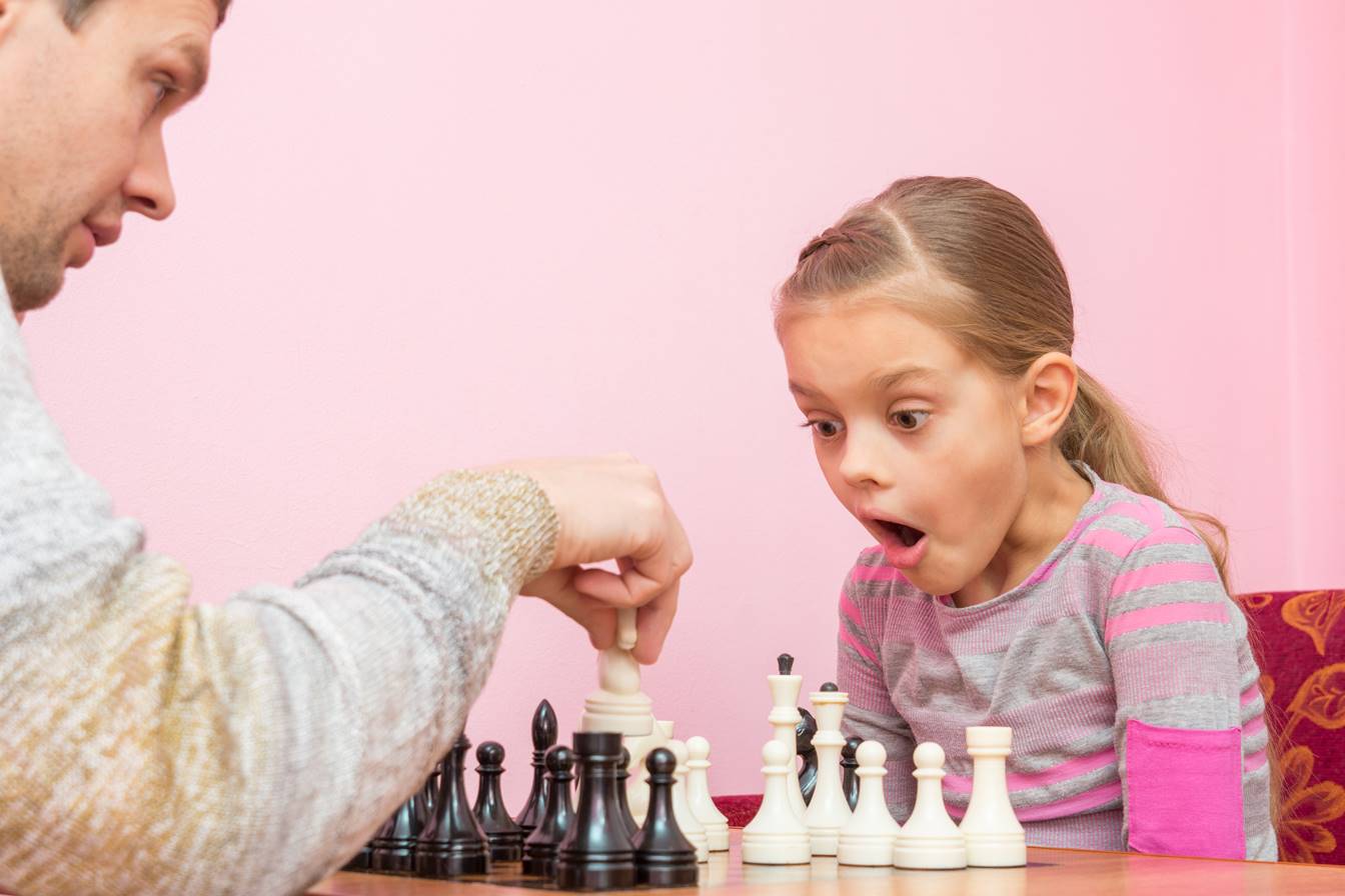 Instructor teaching chess strategies to beginners in Westminster, CA