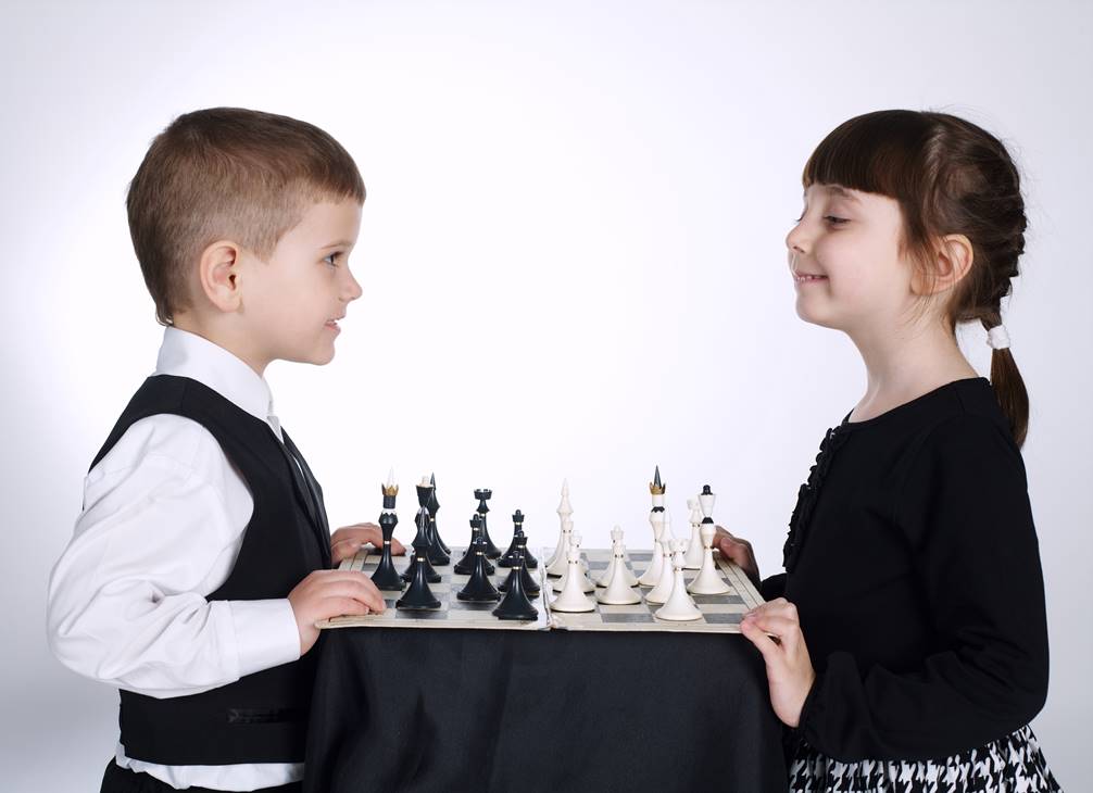 Students playing chess during a club session at Westminster Arts Academy