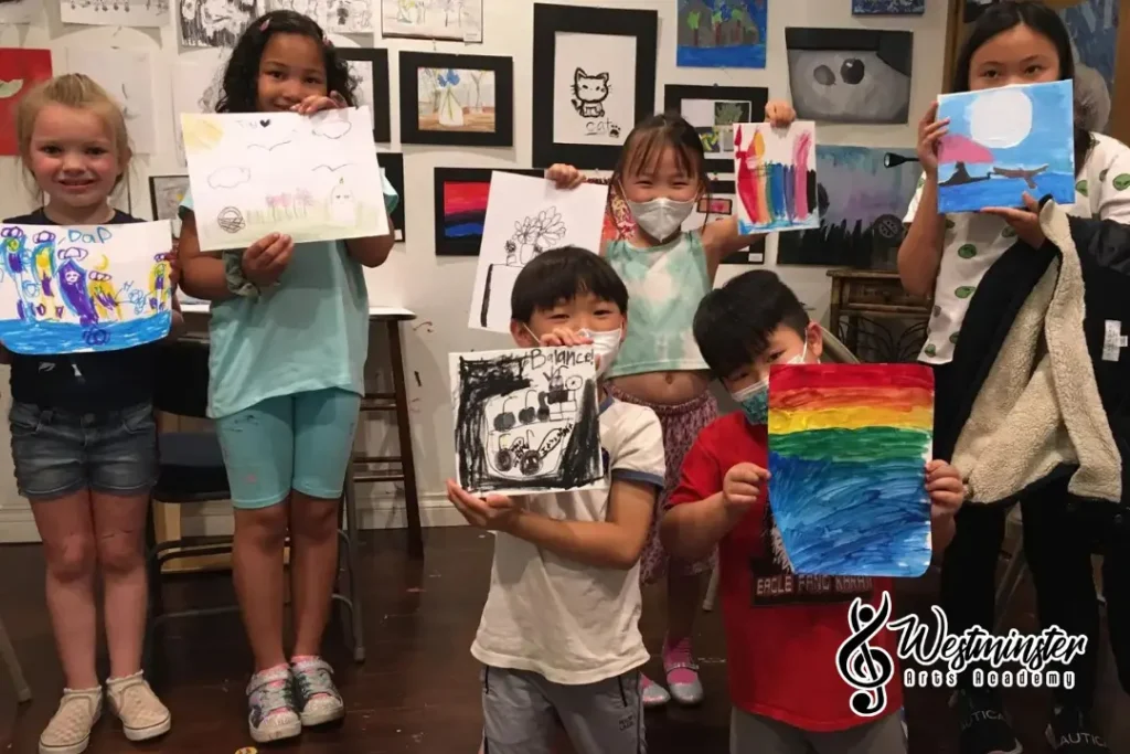Students showcasing their artwork during an art exhibition at Westminster Arts Academy